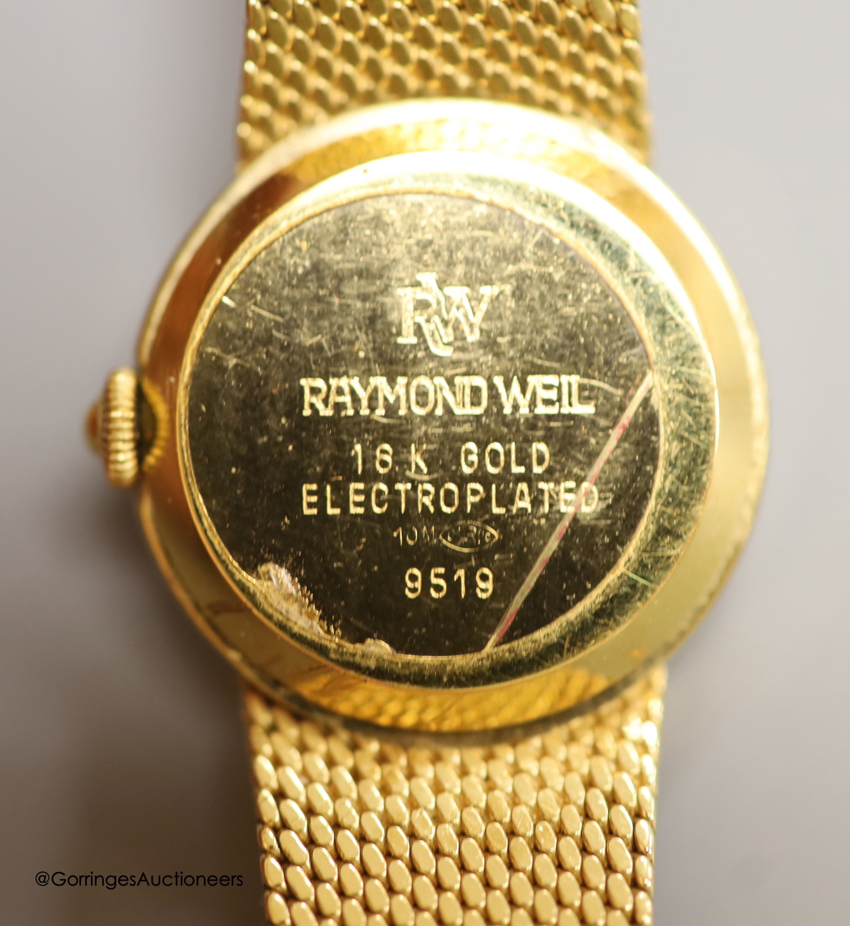 A lady's 18k gold electroplated Raymond Weil quartz wrist watch, overall 20.7cm, with Raymond Weil pouch.
